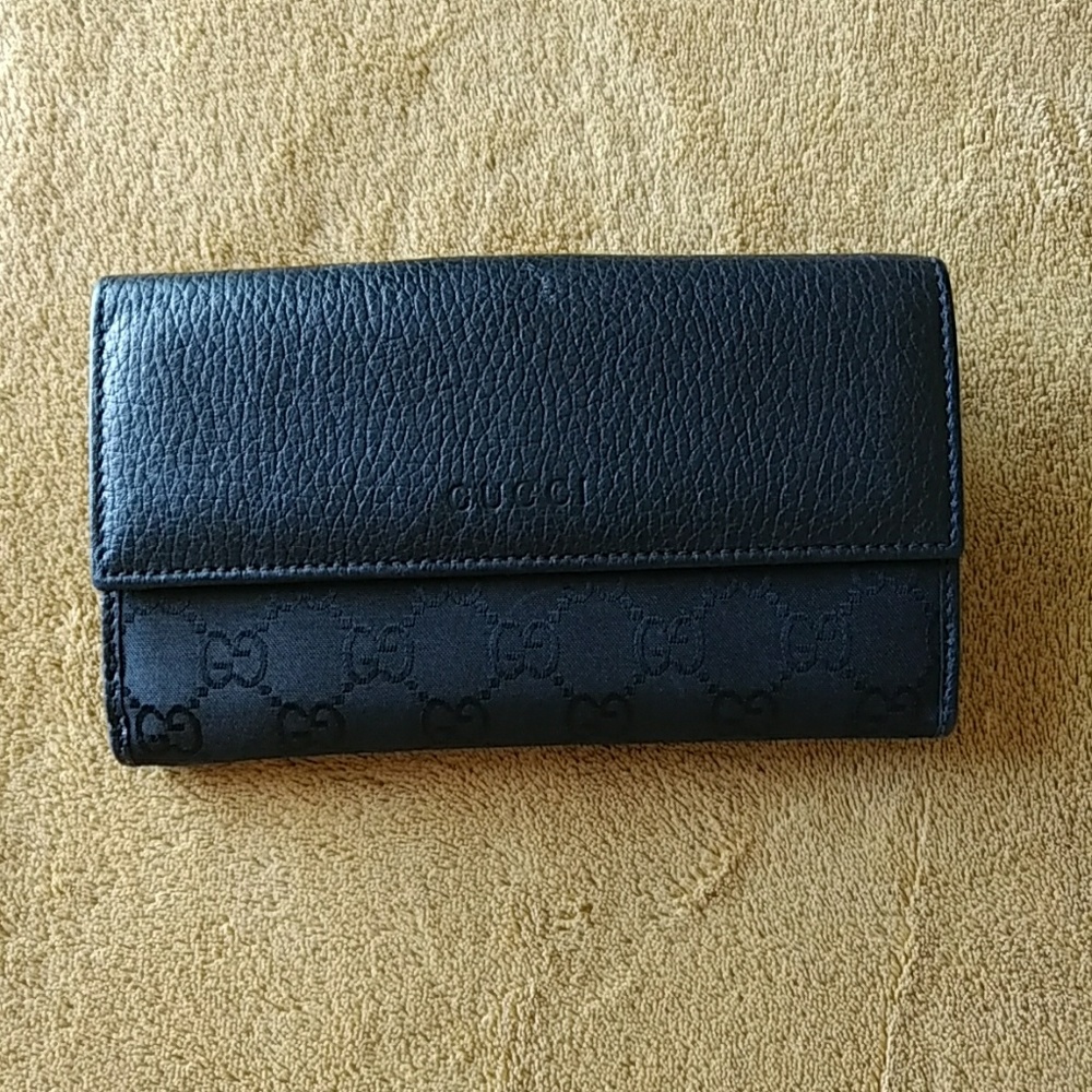 Authentic GUCCI black leather and cloth wallet